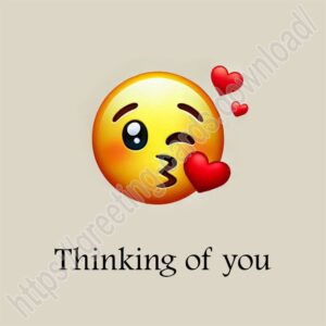 Thinking of you. Card with a smiley face blowing a kiss.